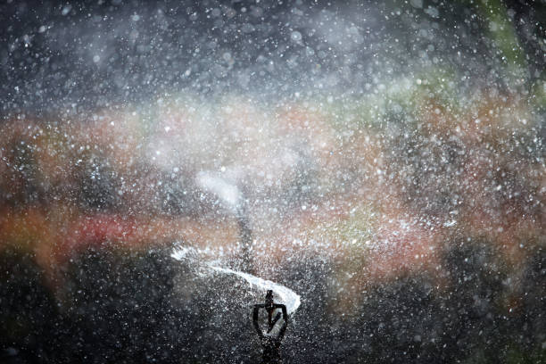 istock Water droplets fall in stormy atmosphere with blurred background 2204540853