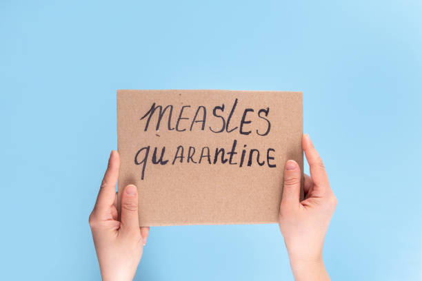 istock Measles alert, quarantine background 2204541142