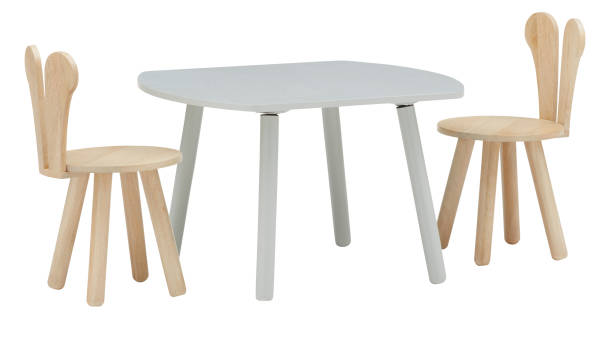istock White wooden table and oak chairs cut out isolated white background with clipping path 2204541171