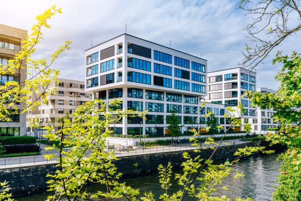 istock Modern Residential Architecture in Berlin Along a Canal Surrounded by Nature 2204548296