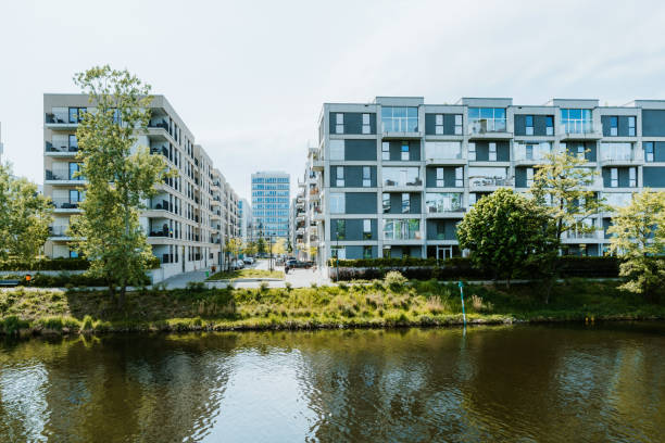 istock Modern Apartment Buildings by a Tree-Lined Canal in Berlin, Germany 2204548884