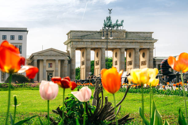 istock Brandenburg Gate with Vibrant Spring Flowers in Foreground in Berlin, Germany 2204549177