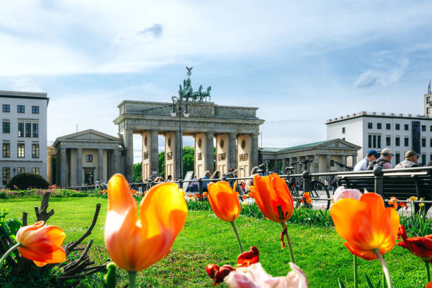 istock Brandenburg Gate Framed by Colorful Spring Tulips under a Clear Blue Sky 2204549277