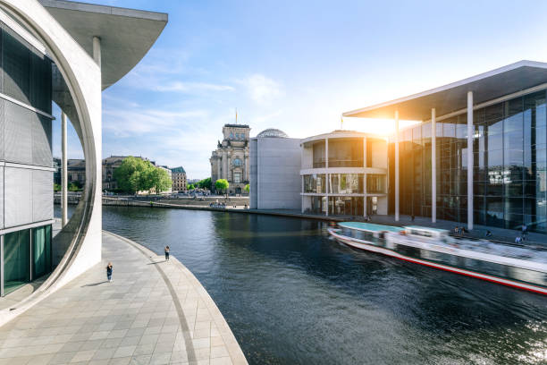 istock Government District in Berlin with Passing Boat 2204549417