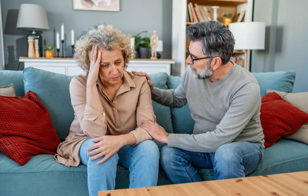 istock Man comforting his wife 2204552653