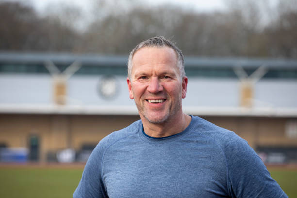 istock Cheerful mature male athlete looking at the camera 2204554490