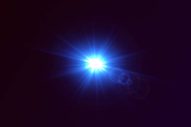 istock A blue glare of light and a flash of a star. 2204554663