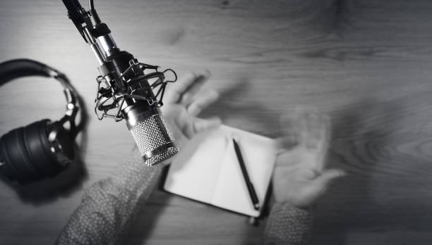 Content creator livestreaming a podcast in the studio