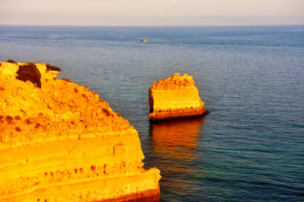 Praia da Marinha, between Portimao and Albufeira, is one of the most beautiful beaches in the Algarve, hiding a series of enchanting bays hidden among the rocks Lagoa Portugal