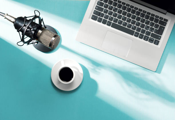 istock Content creator desk with laptop and audio equipment 2204555904