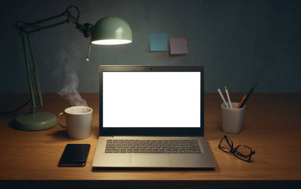 istock Home office desk with laptop and personal items 2204556246