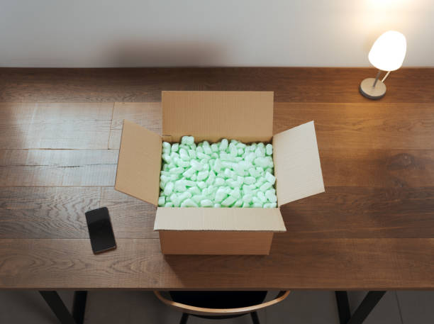 istock Open delivery box on a desk at home 2204556489