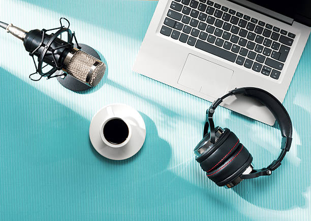 istock Content creator desk with laptop and audio equipment 2204556765