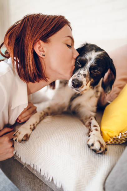 istock Woman love her dog 2204557007