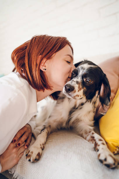 istock Woman love her dog 2204557328