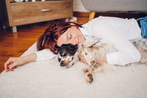 istock Woman love her dog 2204557436