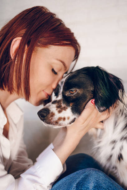 istock Woman love her dog 2204558364