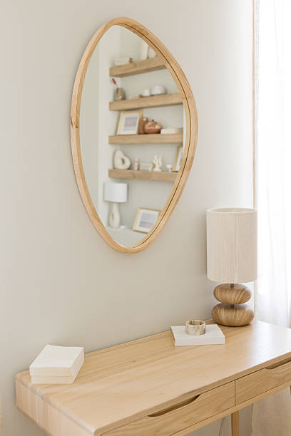 istock Lamp and mirror on wooden table 2204559136