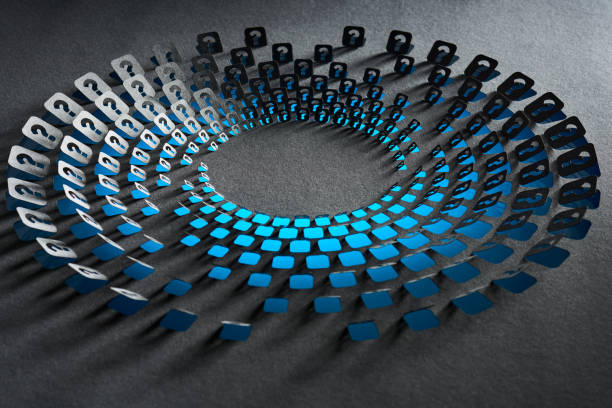 istock Abstract cut paper artwork featuring a circular pattern of question marks and blue squares on a dark background. 2204559408