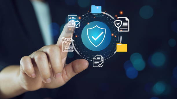 istock Hand touching a digital padlock icon on a virtual screen a cyber security and data protection.Cybersecurity concept with digital shield and data protection icons. 2204563812