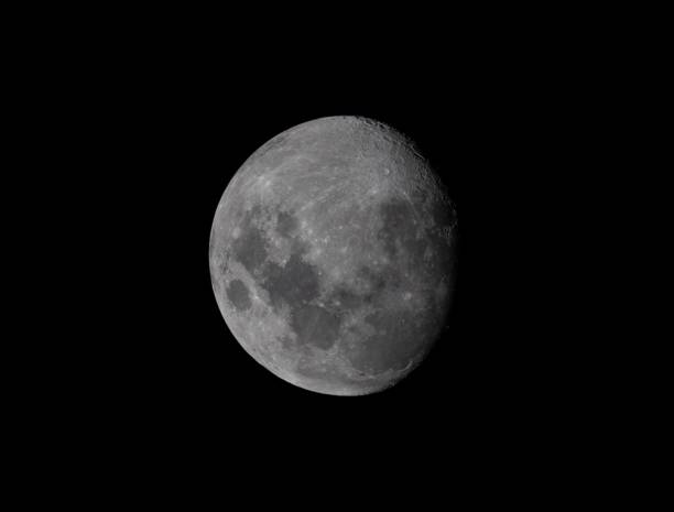 istock Waxing Gibbous Moon in the Black Sky 2204564842