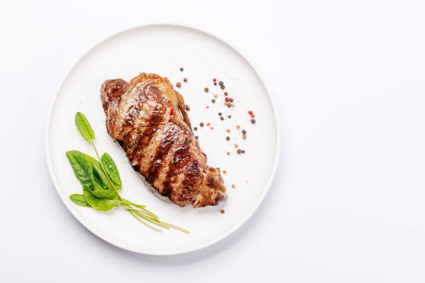 istock A perfectly cooked striploin steak with a juicy, tender texture 2204565752
