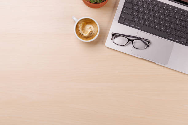 istock A clean and minimal desk setup featuring a laptop and a coffee cup 2204566344