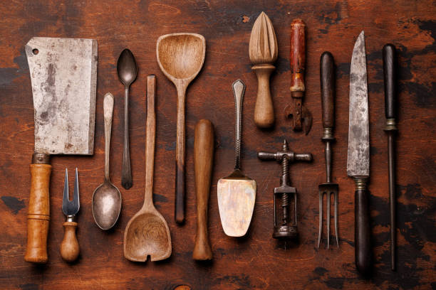 istock A collection of various retro kitchen and cooking utensils displayed on a table 2204566729