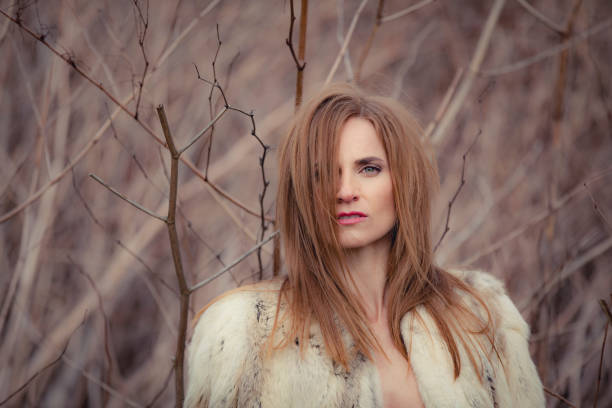 red hair woman, outdoor portrait.