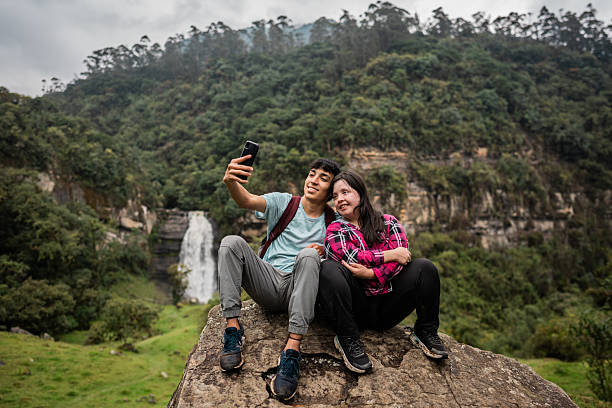 istock Young couple taking a selfie at nature 2204569878