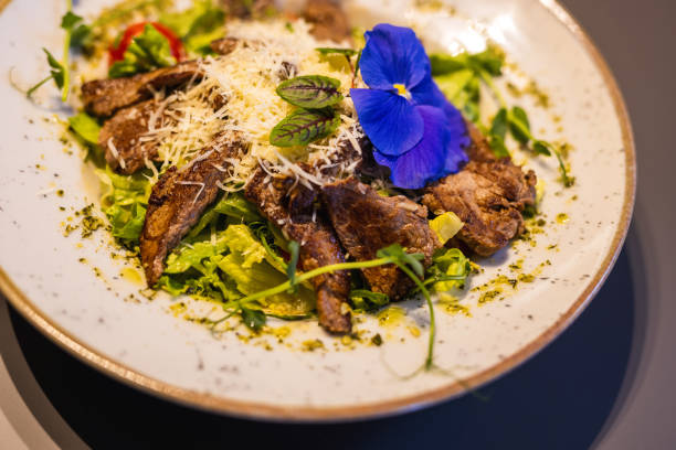 istock Bowl of steak salad. 2204572300