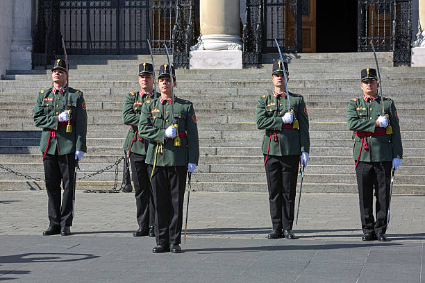 Budapest, Hungary - October 4, 2015: The Parliament Guards during the Ceremony of changing performed at the entrance to the Hungarian Parliament Building every hour in 20 minutes.