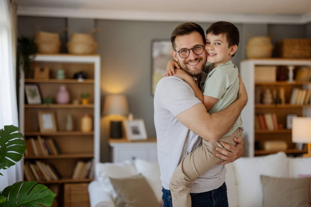 istock Family Love: Dad and Little Boy Embracing in a Heartfelt Moment 2204576764