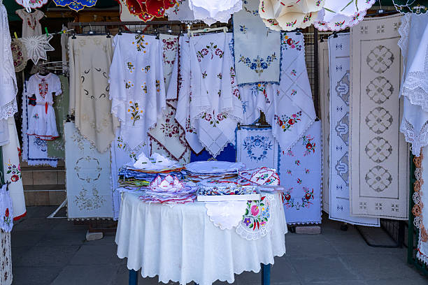 istock Traditional embroidered textiles at a market stall 2204576798