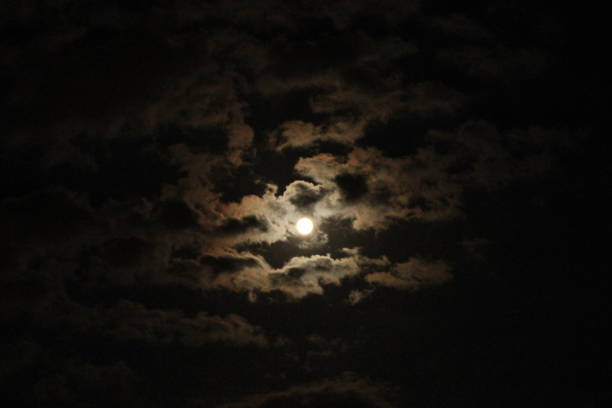 istock Full Moon At The Cloudy Sky 2204579515