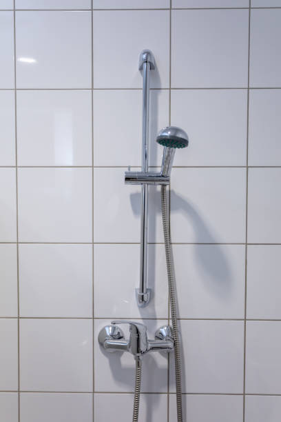 istock A Beautiful Modern Shower Fixture Perfectly Positioned in a Minimalist Bathroom Setting 2204581091