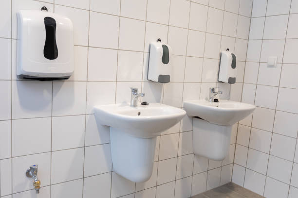 istock A modern public restroom with multiple sinks and hand dryers for convenience and cleanliness 2204582459