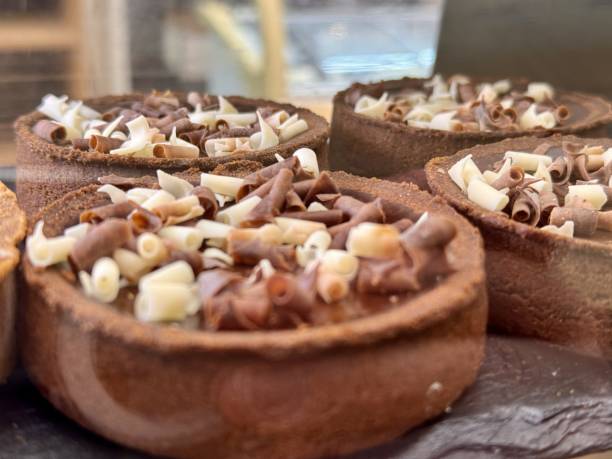 istock Delicious and Decadent Chocolate Tartlets Adorned with Shavings for Ultimate Indulgence 2204584253