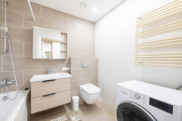 istock Modern Home Bathroom Interior with Washing Machine and Minimalist Design Features 2204585575