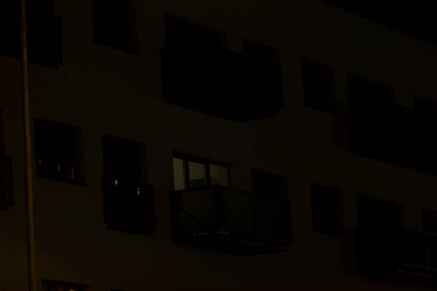 istock A tall building featuring numerous windows is beautifully lit up at night 2204586183