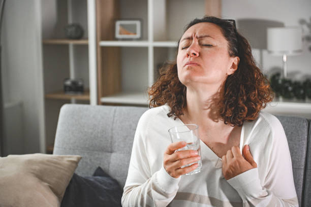 istock woman suffering from heatstroke at home 2204587688