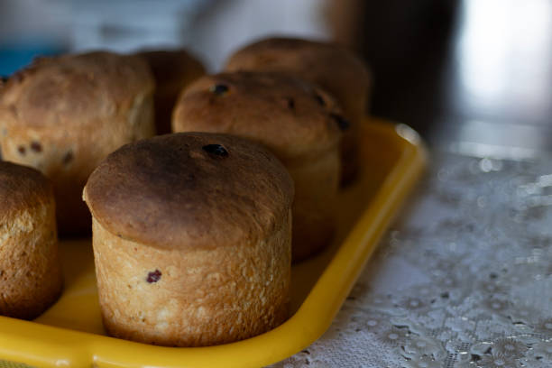Close up of muffins in a bowl on a table.