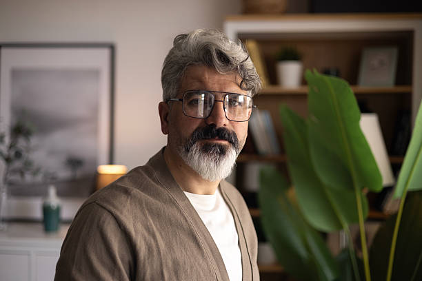 istock Head shot confident handsome bearded man looking at camera 2204588603