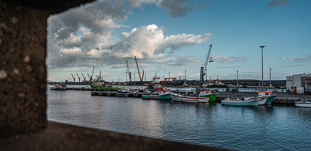 Boats docked at pier in Ponta Delgada, Portugal.