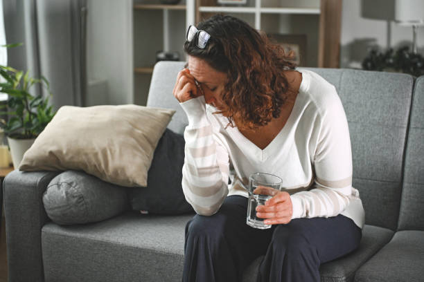 istock woman suffering from heatstroke at home 2204589032