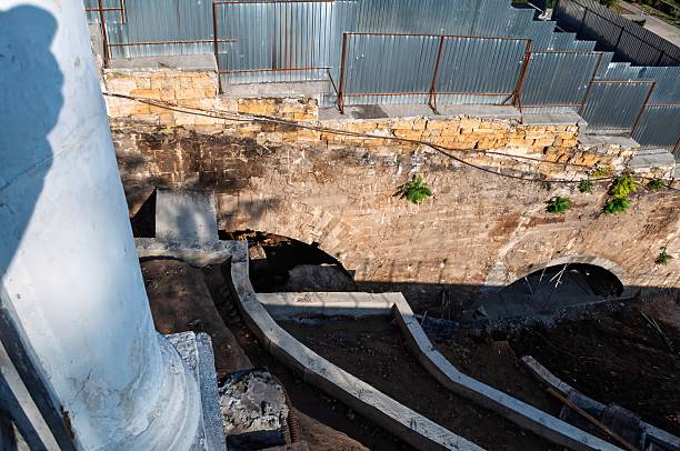 istock A stone building undergoes restoration, showcasing aged architecture and rich historical texture. 2204590058