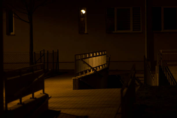istock There is a darkened room featuring a ramp located right in its center 2204593043