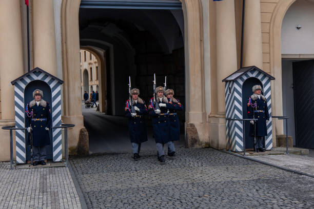 Lisbon, Portugal - June 12, 2024: portrait of a female honour guard of the National Republican Guard (GNR), Portugal's national gendarmerie corps, in front of the entrance to the National Republican Guard Museum in the Carmo district of the Portuguese capital Lisbon; Lisbon, Portugal