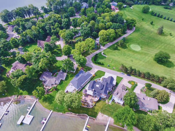 istock Aerial Suburban Luxury: Golf Course and Waterfront Homes 2204602468