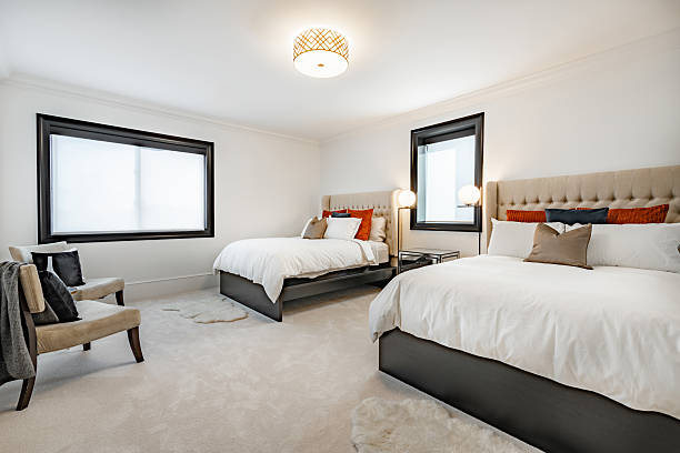 istock Simple guest bedroom with 2 beds 2204605174